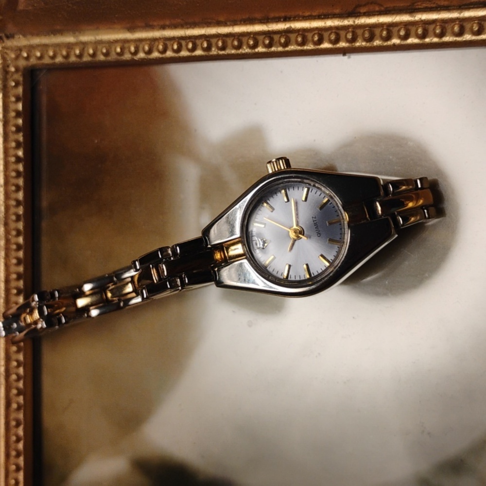 Elegant Woman's Gold and Silver Quartz Watch